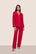 Model is wearing Gisele Printed TENCEL™ Modal Long PJ Set  in Nutcracker Holly Red/Ivory
