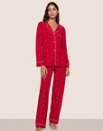 Model is wearing Gisele Printed TENCEL™ Modal Long PJ Set  in Nutcracker Holly Red/Ivory