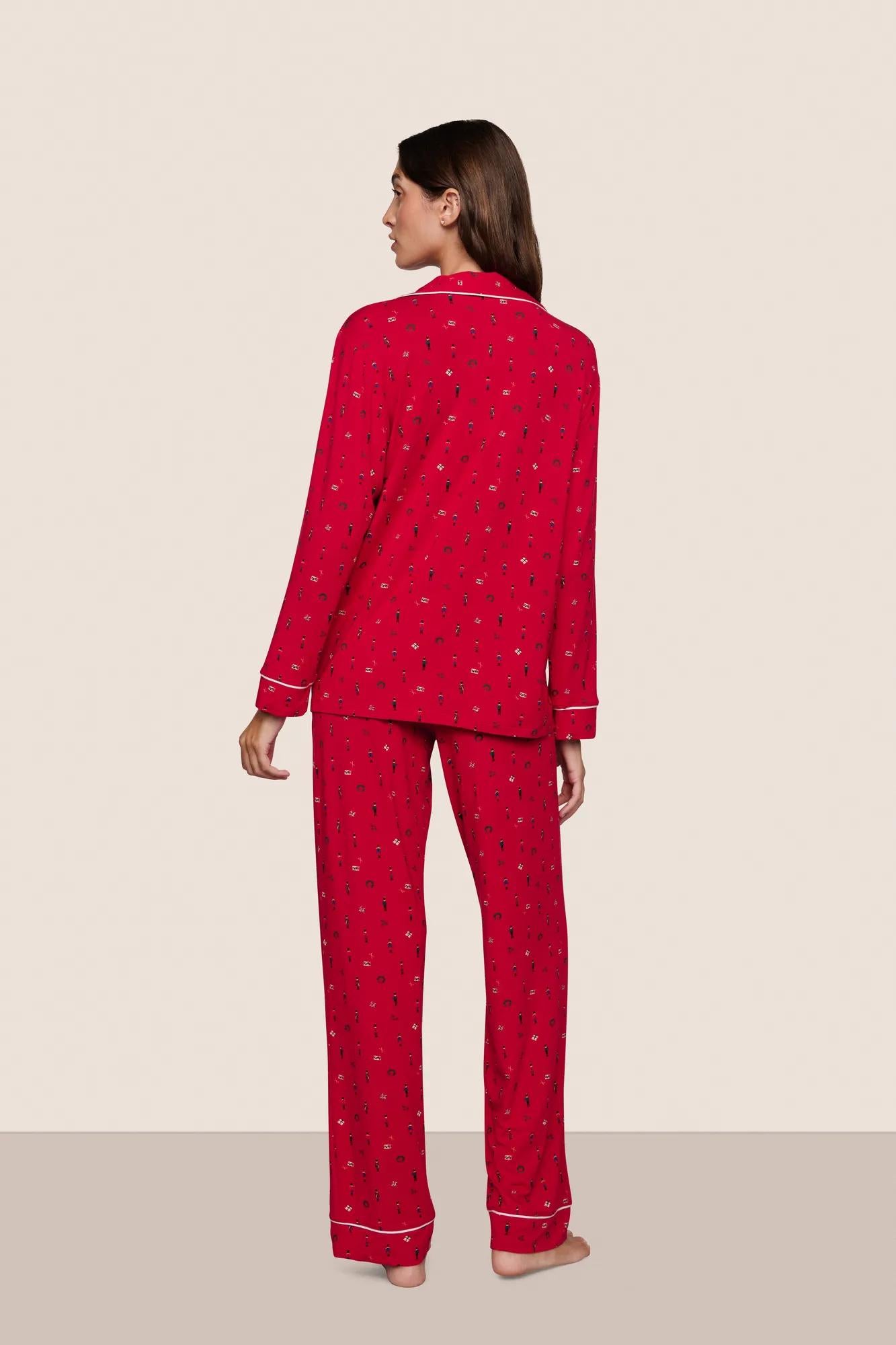 Model is wearing Gisele Printed TENCEL™ Modal Long PJ Set  in Nutcracker Holly Red/Ivory