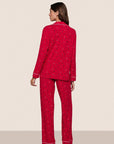 Model is wearing Gisele Printed TENCEL™ Modal Long PJ Set  in Nutcracker Holly Red/Ivory