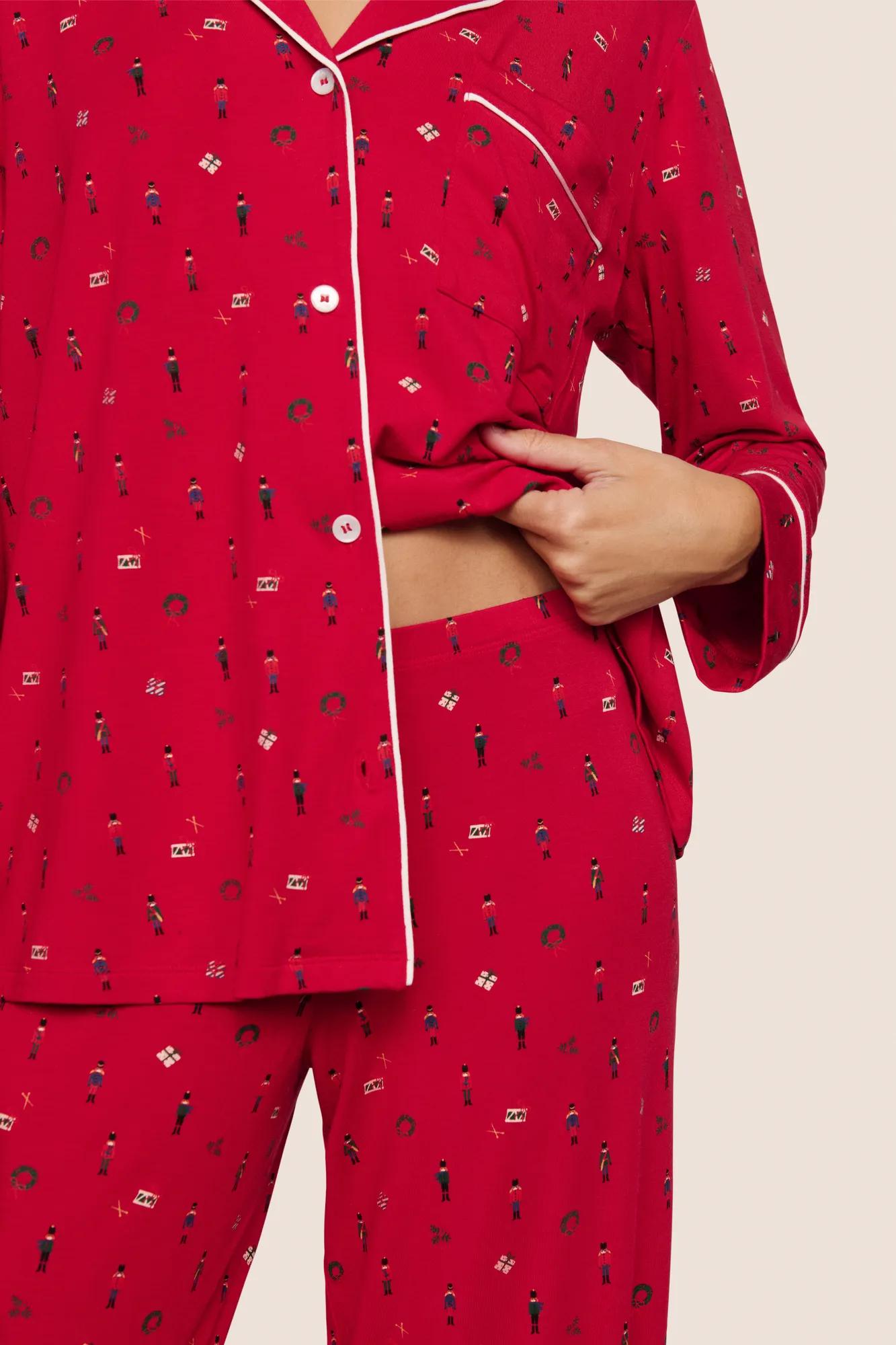 Model is wearing Gisele Printed TENCEL™ Modal Long PJ Set  in Nutcracker Holly Red/Ivory