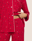 Model is wearing Gisele Printed TENCEL™ Modal Long PJ Set  in Nutcracker Holly Red/Ivory