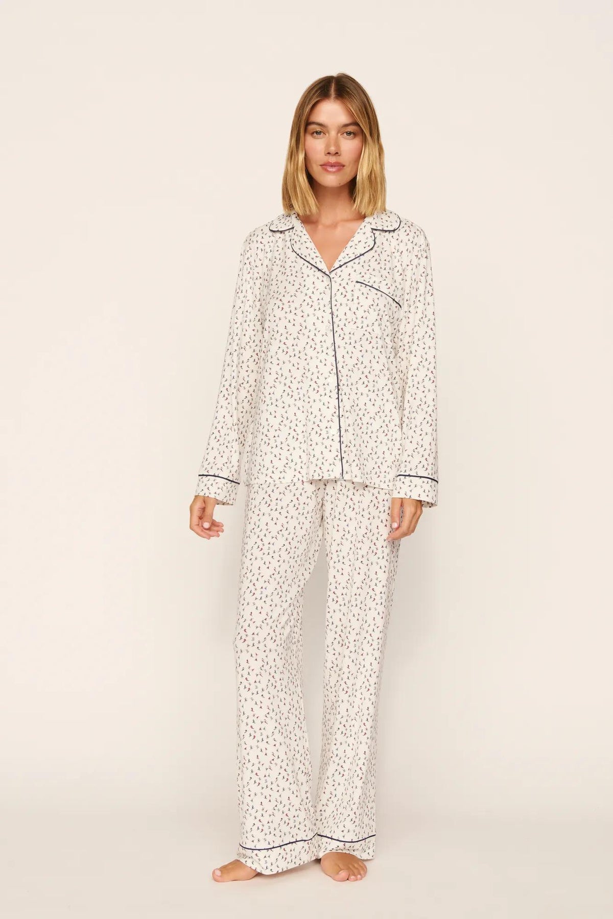 Model is wearing Gisele Printed TENCEL™ Modal Long PJ Set in On The Slopes Ivory/Navy