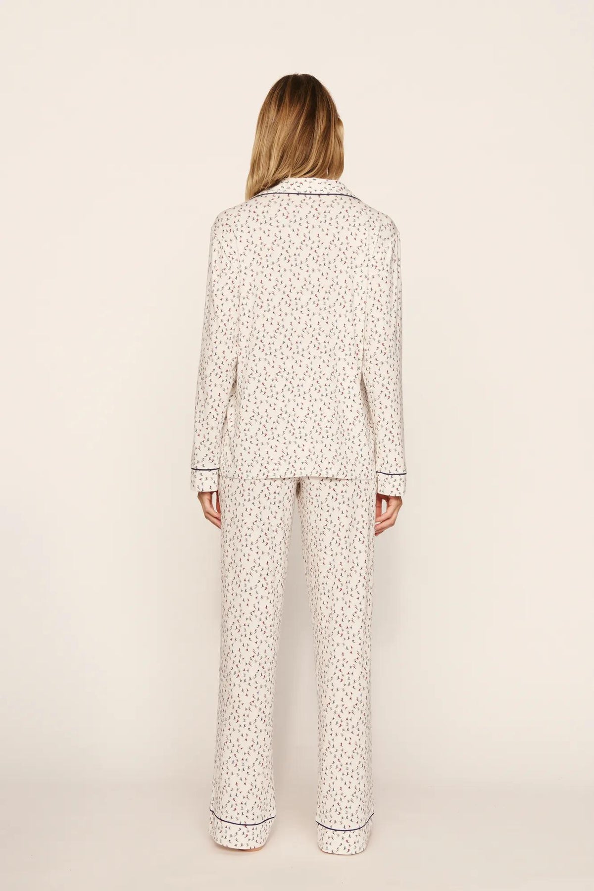 Model is wearing Gisele Printed TENCEL™ Modal Long PJ Set in On The Slopes Ivory/Navy