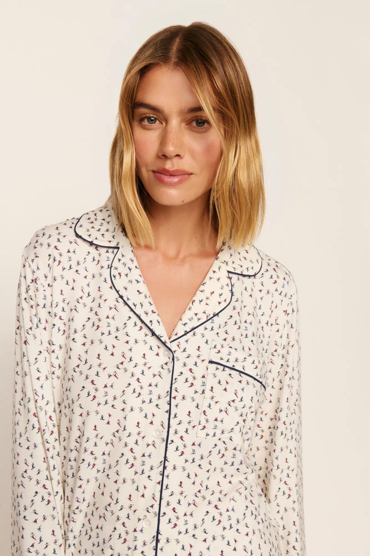 Model is wearing Gisele Printed TENCEL™ Modal Long PJ Set in On The Slopes Ivory/Navy