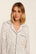 Model is wearing Gisele Printed TENCEL™ Modal Long PJ Set in On The Slopes Ivory/Navy