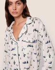Model is wearing Gisele Printed TENCEL™ Modal Long PJ Set  in Ski Chalet Ivory/Pine
