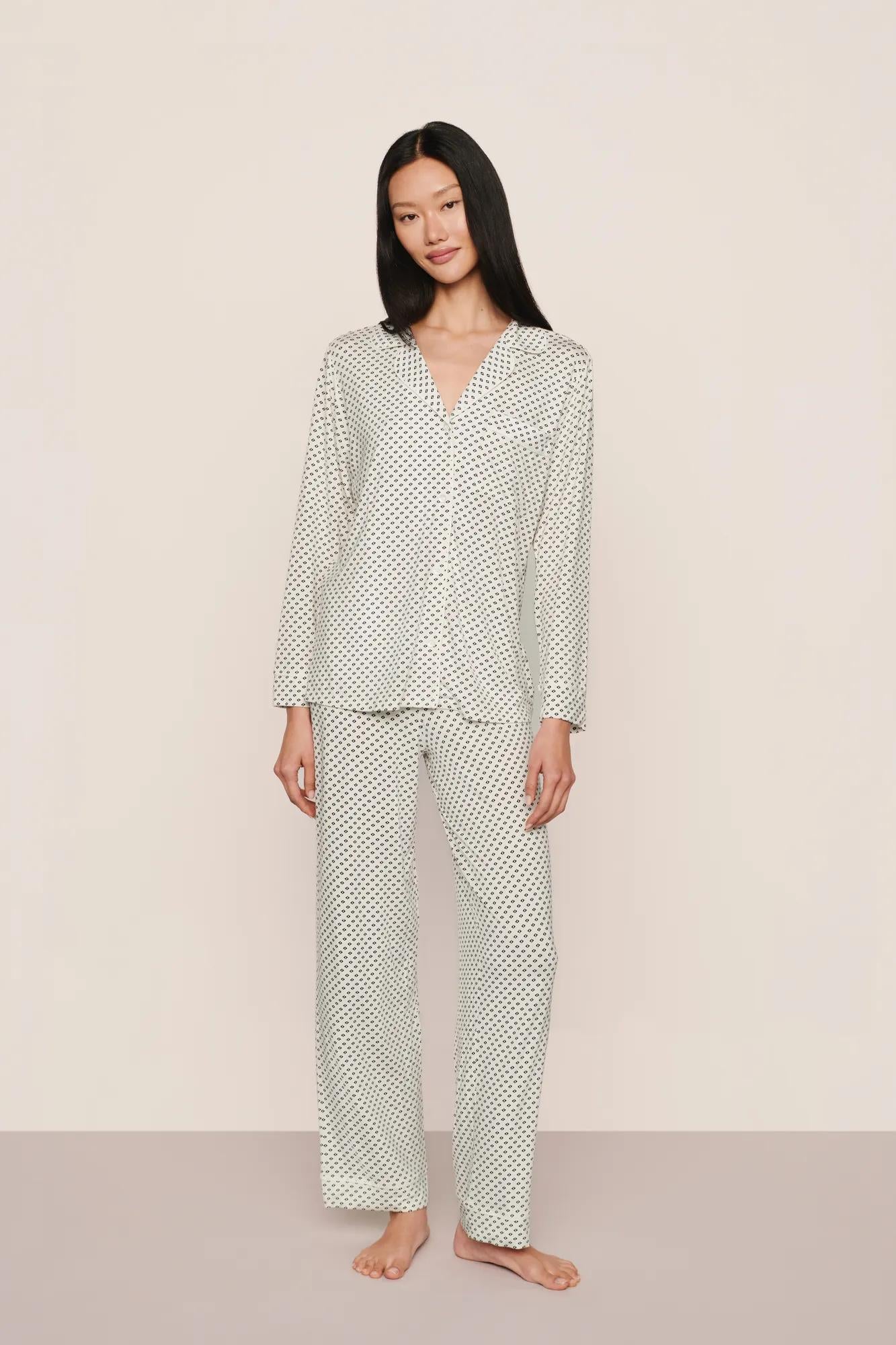 Model is wearing Gisele Printed TENCEL™ Modal Long PJ Set in Tide Dot Ivory/Ivory