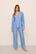 Model is wearing Gisele Printed TENCEL™ Modal Long PJ Set in  Nordic Stripes Vista Blue/Iv