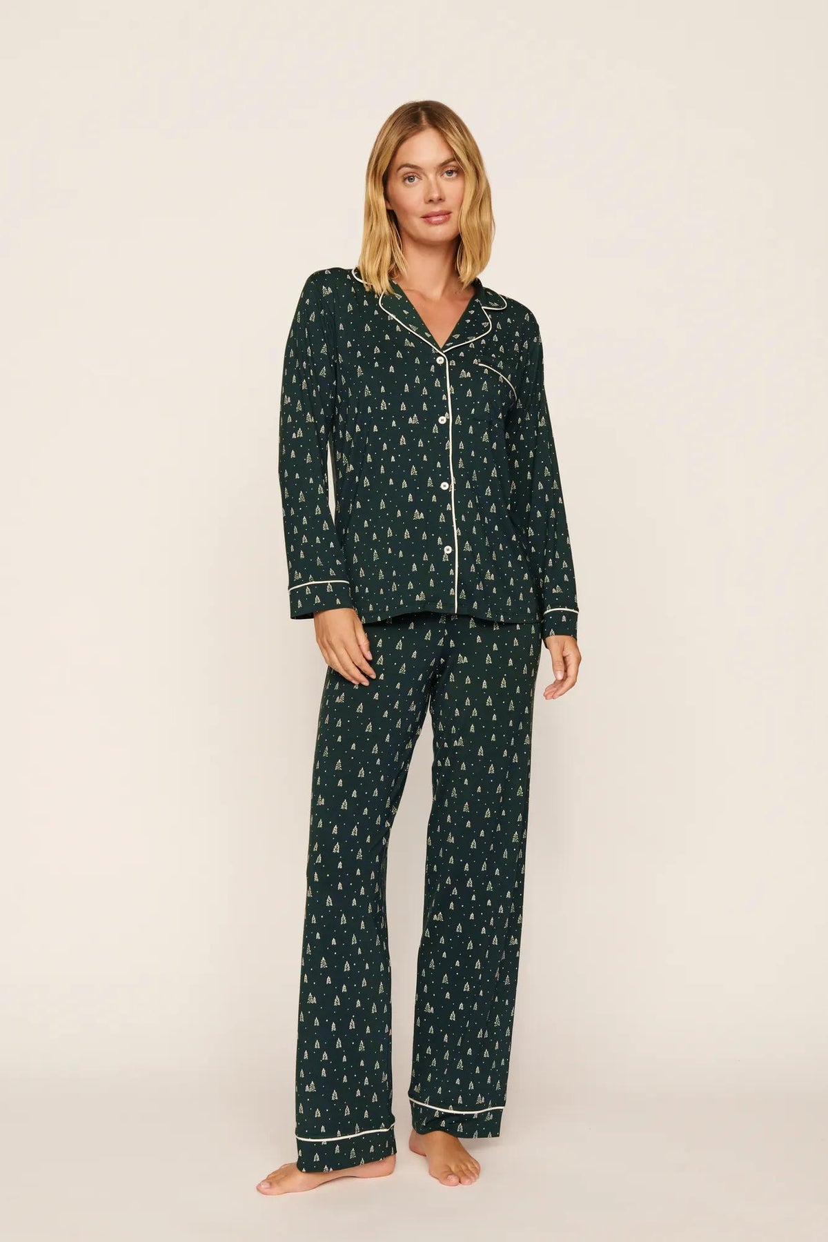 Model is wearing Gisele Printed TENCEL™ Modal Long PJ Set in Winter Pine/Ivory