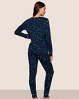 Model is wearing Gisele Printed TENCEL™ Modal Crewneck PJ Set  in Forest Pine Navy/Ivory