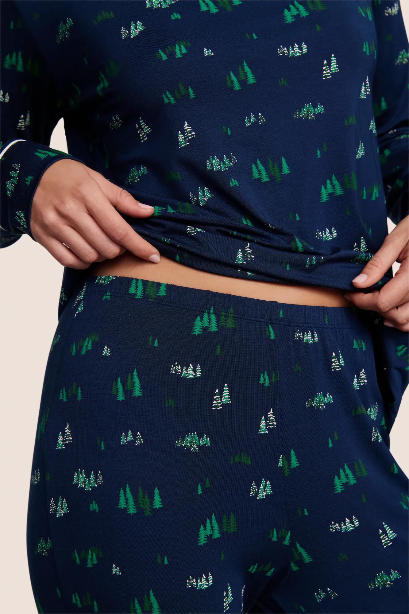 Model is wearing Gisele Printed TENCEL™ Modal Crewneck PJ Set  in Forest Pine Navy/Ivory