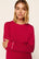 Model is wearing Gisele Printed TENCEL™ Modal Crewneck PJ Set in Hollyberry Holly Red/Ivory