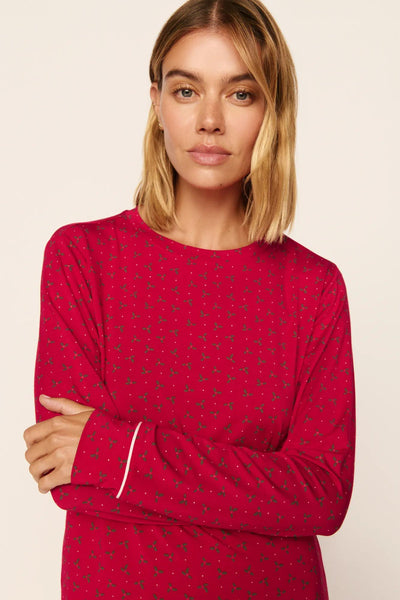 Model is wearing Gisele Printed TENCEL™ Modal Crewneck PJ Set in Hollyberry Holly Red/Ivory