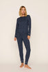 Model is wearing Gisele Printed TENCEL™ Modal Crewneck PJ Set in Santa Paws Navy/Ivory