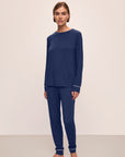 Model is wearing Gisele TENCEL™ Modal Crewneck PJ Set in Navy/Ivory