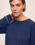 Model is wearing Gisele TENCEL™ Modal Crewneck PJ Set in Navy/Ivory