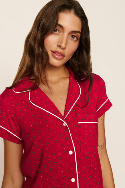 Model is wearing Gisele Printed TENCEL™ Modal Shortie Short PJ Set in Hollyberry Holly Red/Ivory