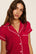 Model is wearing Gisele Printed TENCEL™ Modal Shortie Short PJ Set in Hollyberry Holly Red/Ivory