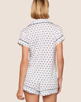 Model is wearing Gisele Printed TENCEL™ Modal Shortie Short PJ Set  in Hannukah Glow Nouvean Navy/Ny