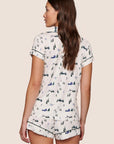 Model is wearing Gisele Printed TENCEL™ Modal Shortie Short PJ Set  in Ski Chalet Ivory/Pine