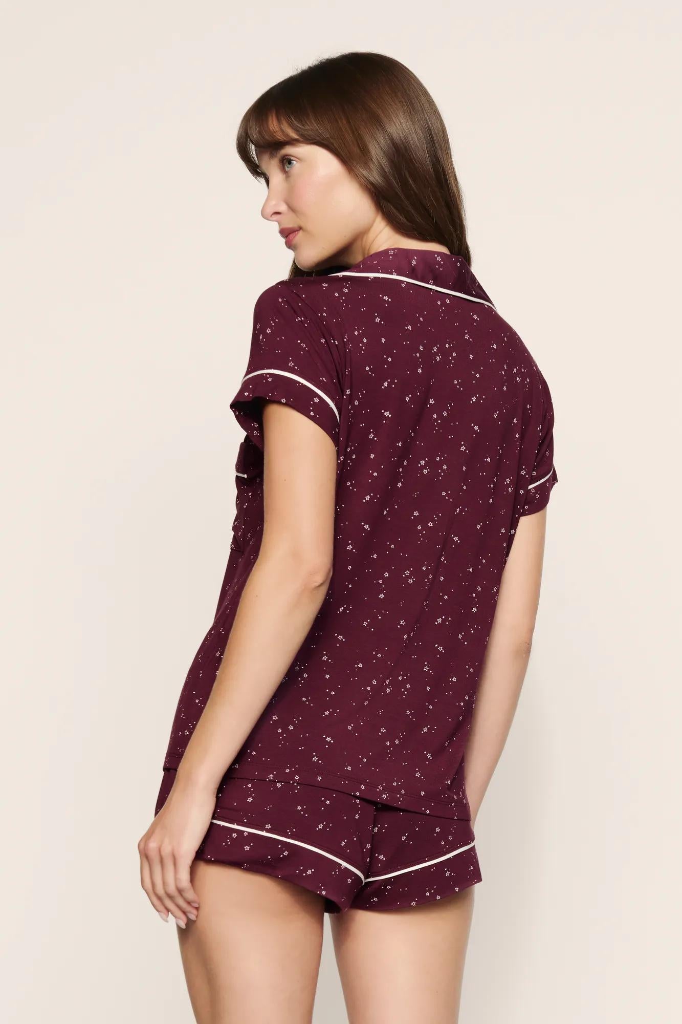Model is wearing Gisele Printed TENCEL™ Modal Shortie Short PJ Set in Starlight Wildberry/Ivory