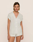 Model is wearing Gisele Printed TENCEL™ Modal Shortie Short PJ Set in Tide Dot Ivory/Ivory