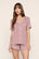 Model is wearing Gisele Printed TENCEL™ Modal Relaxed Short PJ Set in Animal Instinct Woodrose/Ivory