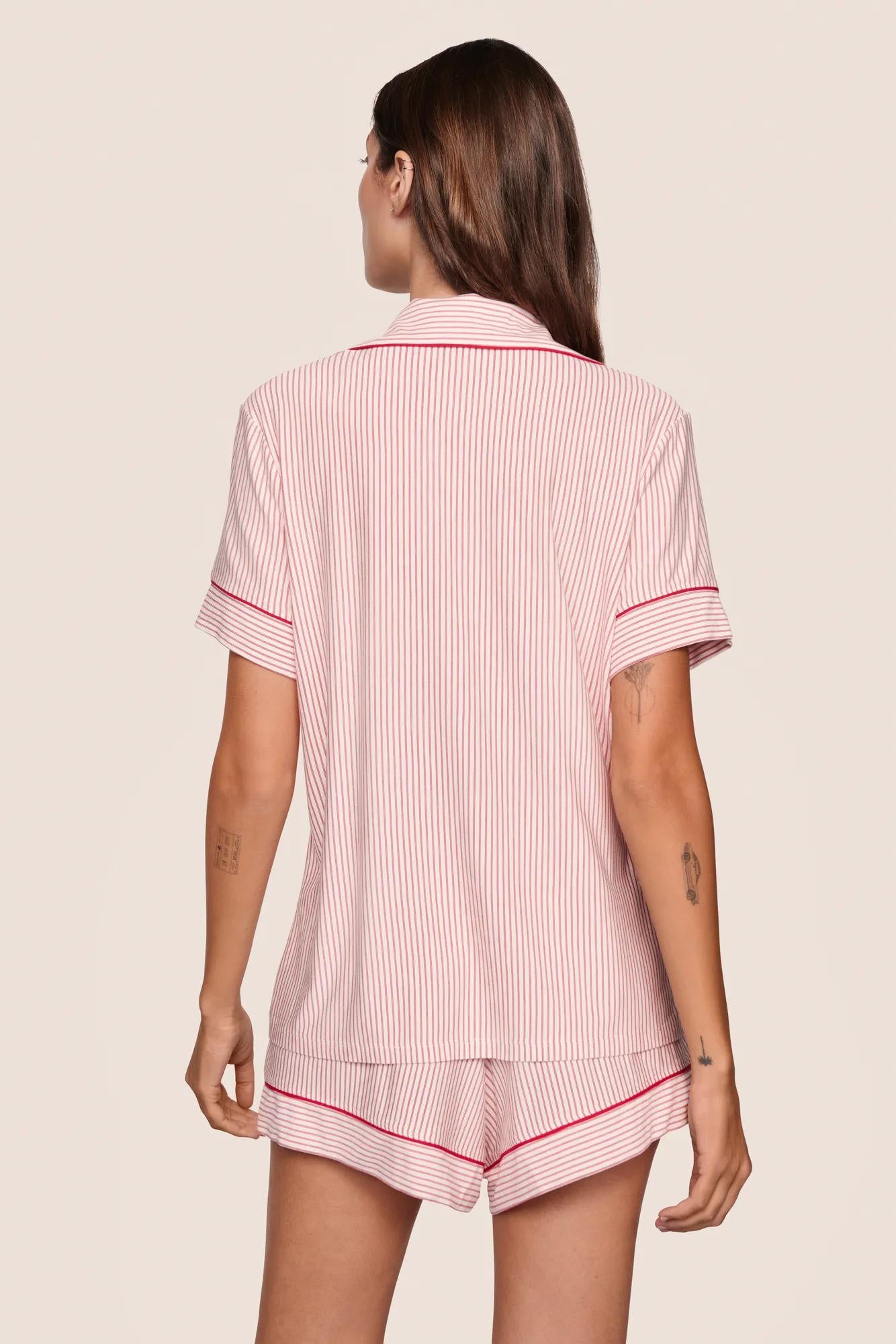 Model is wearing Gisele Printed TENCEL™ Modal Relaxed Short PJ Set  in Duo Stripe Hollyred/Hollyred