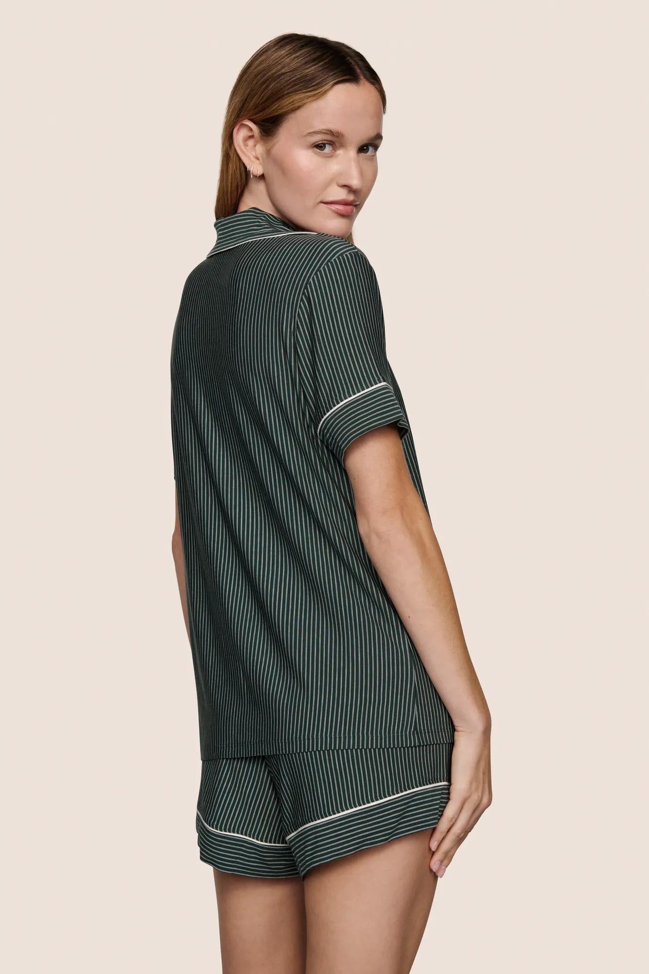 Model is wearing Gisele Printed TENCEL™ Modal Relaxed Short PJ Set  in Duo Stripe Pine/Ivory