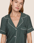 Model is wearing Gisele Printed TENCEL™ Modal Relaxed Short PJ Set  in Duo Stripe Pine/Ivory