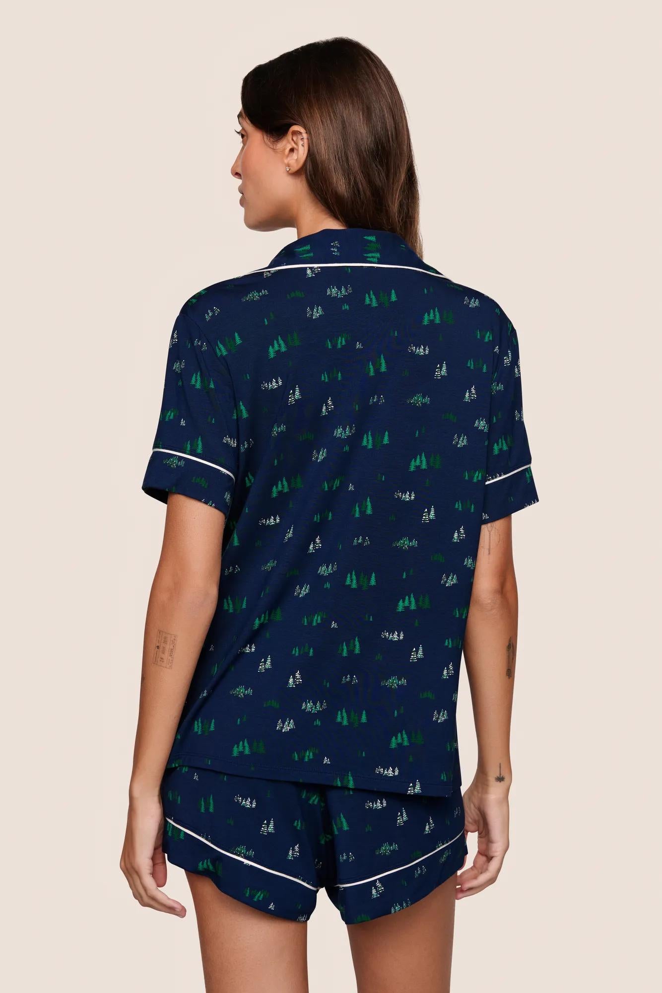 Model is wearing Gisele Printed TENCEL™ Modal Relaxed Short PJ Set  in Forest Pine Navy/Ivory