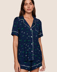 Model is wearing Gisele Printed TENCEL™ Modal Relaxed Short PJ Set  in Forest Pine Navy/Ivory