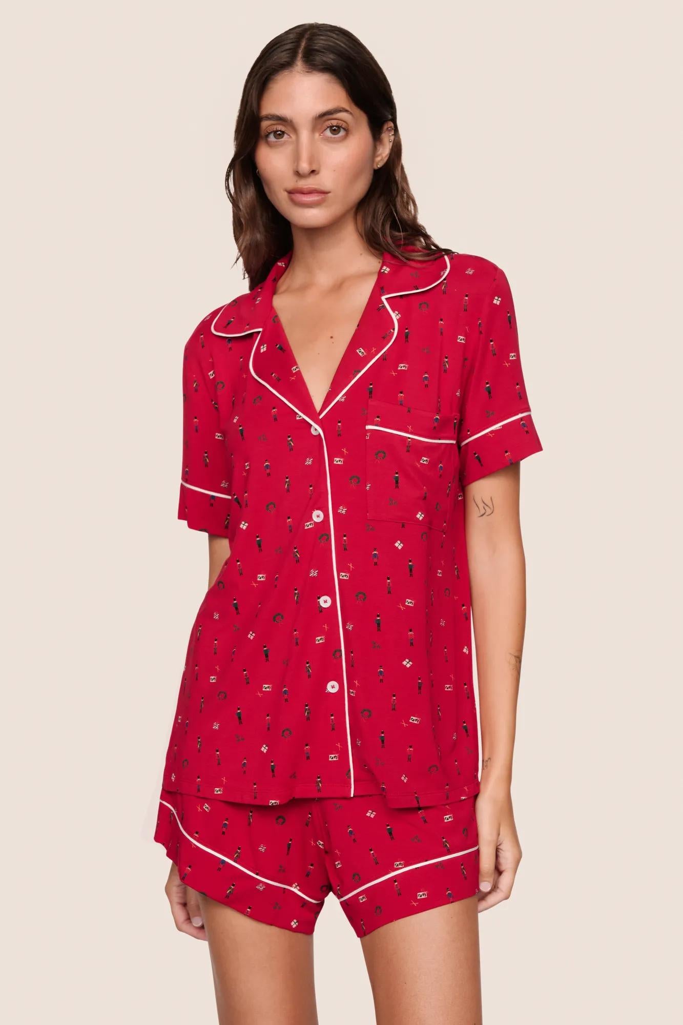 Model is wearing Gisele Printed TENCEL™ Modal Relaxed Short PJ Set  in Nutcracker Holly Red/Ivory