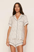 Model is wearing Gisele Printed TENCEL™ Modal Relaxed Short PJ Set in On The Slopes Ivory/Navy