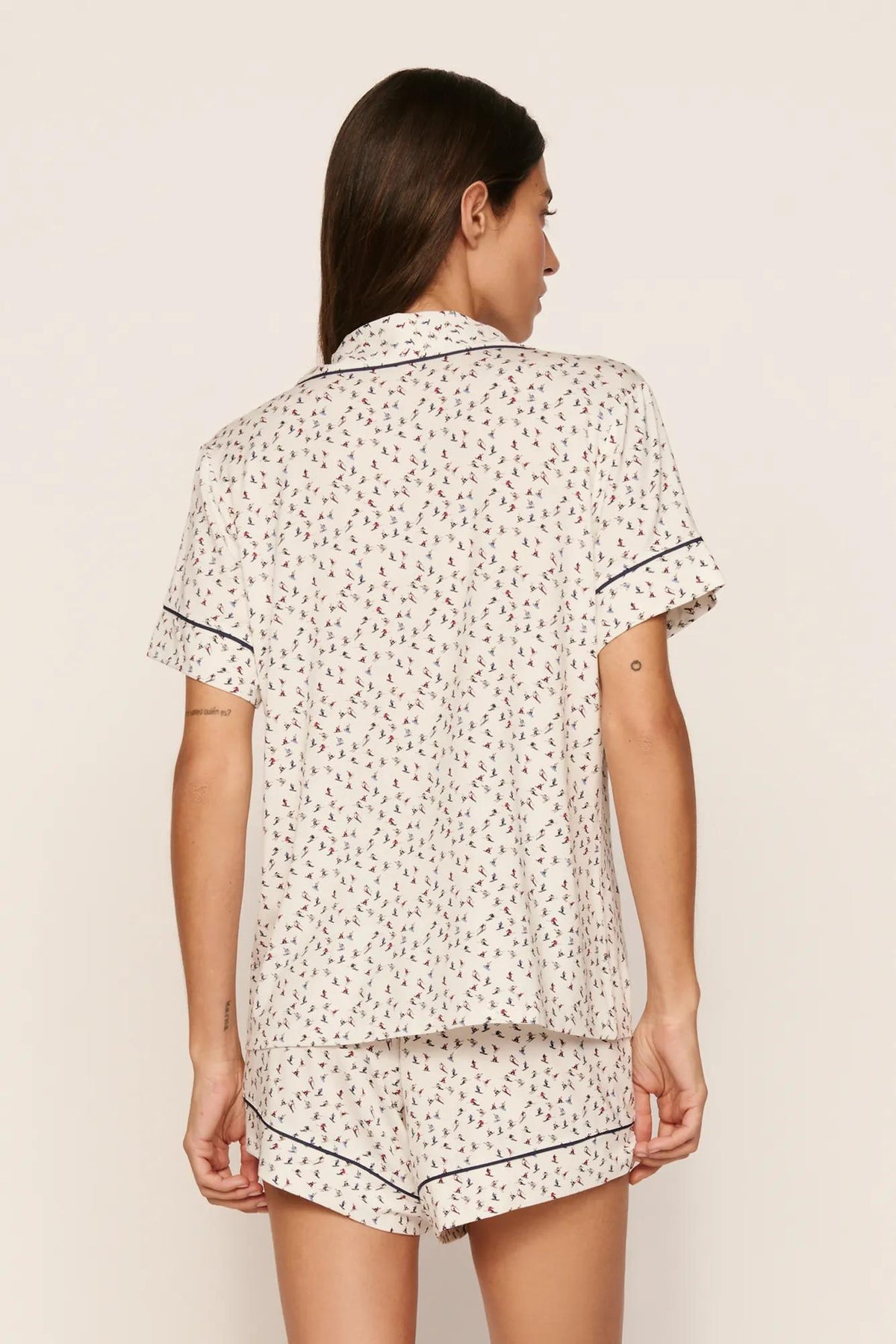 Model is wearing Gisele Printed TENCEL™ Modal Relaxed Short PJ Set in On The Slopes Ivory/Navy