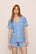 Model is wearing Gisele Printed TENCEL™ Modal Relaxed Short PJ Set in  Nordic Stripes Vista Blue/Iv