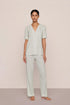 Model is wearing Gisele Printed TENCEL™ Modal Short Sleeve Pant PJ Set in Tide Dot Ivory/Ivory