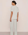 Model is wearing Gisele Printed TENCEL™ Modal Short Sleeve Pant PJ Set in Tide Dot Ivory/Ivory