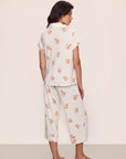 Model is wearing Gisele Printed TENCEL™ Modal Short Sleeve Cropped PJ Set in  Floral Bloom Ivy/Vanilla Cream