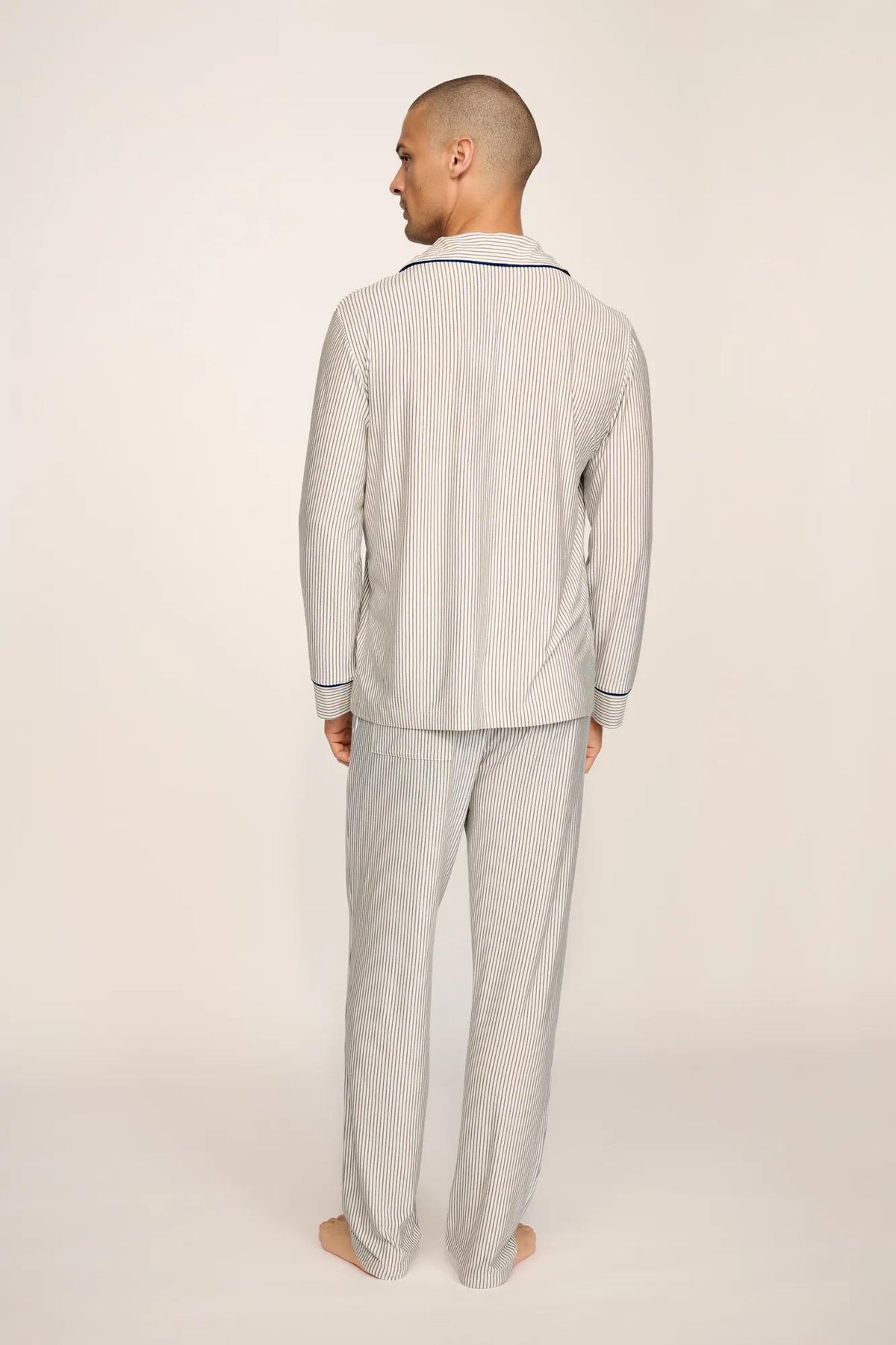 Model is wearing William Printed TENCEL™ Modal Long PJ Set in Duo Stripe Ivory/Navy