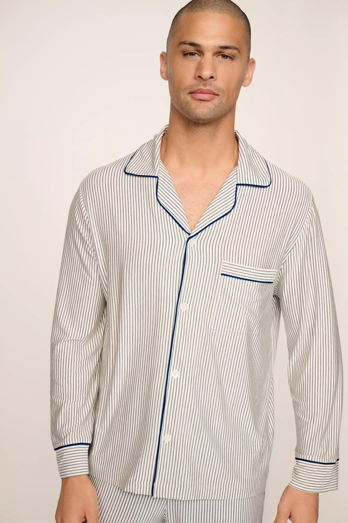 Model is wearing William Printed TENCEL™ Modal Long PJ Set in Duo Stripe Ivory/Navy
