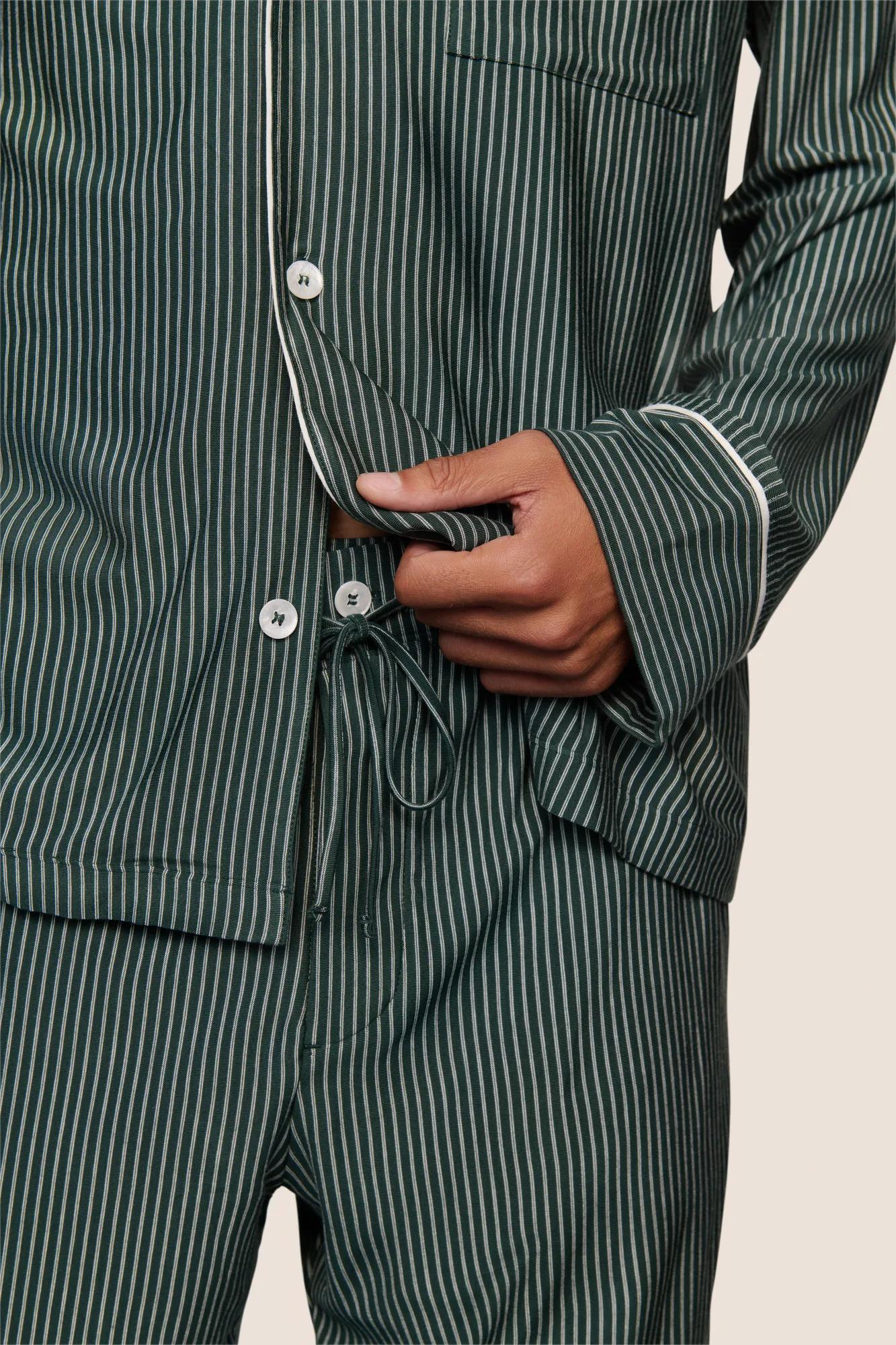 Model is wearing William Printed TENCEL™ Modal Long PJ Set  in Duo Stripe Pine/Ivory