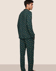 Model is wearing William Printed TENCEL™ Modal Long PJ Set  in Holiday Dogs Pine/Ivory