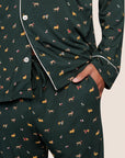 Model is wearing William Printed TENCEL™ Modal Long PJ Set  in Holiday Dogs Pine/Ivory