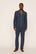 Model is wearing William Printed TENCEL™ Modal Long PJ Set in Santa Paws Navy/Ivory