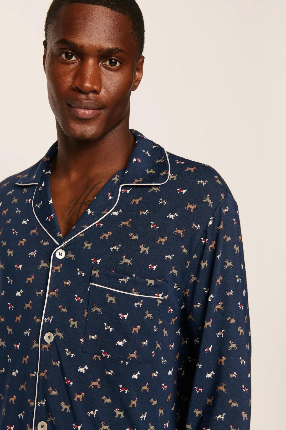 Model is wearing William Printed TENCEL™ Modal Long PJ Set in Santa Paws Navy/Ivory