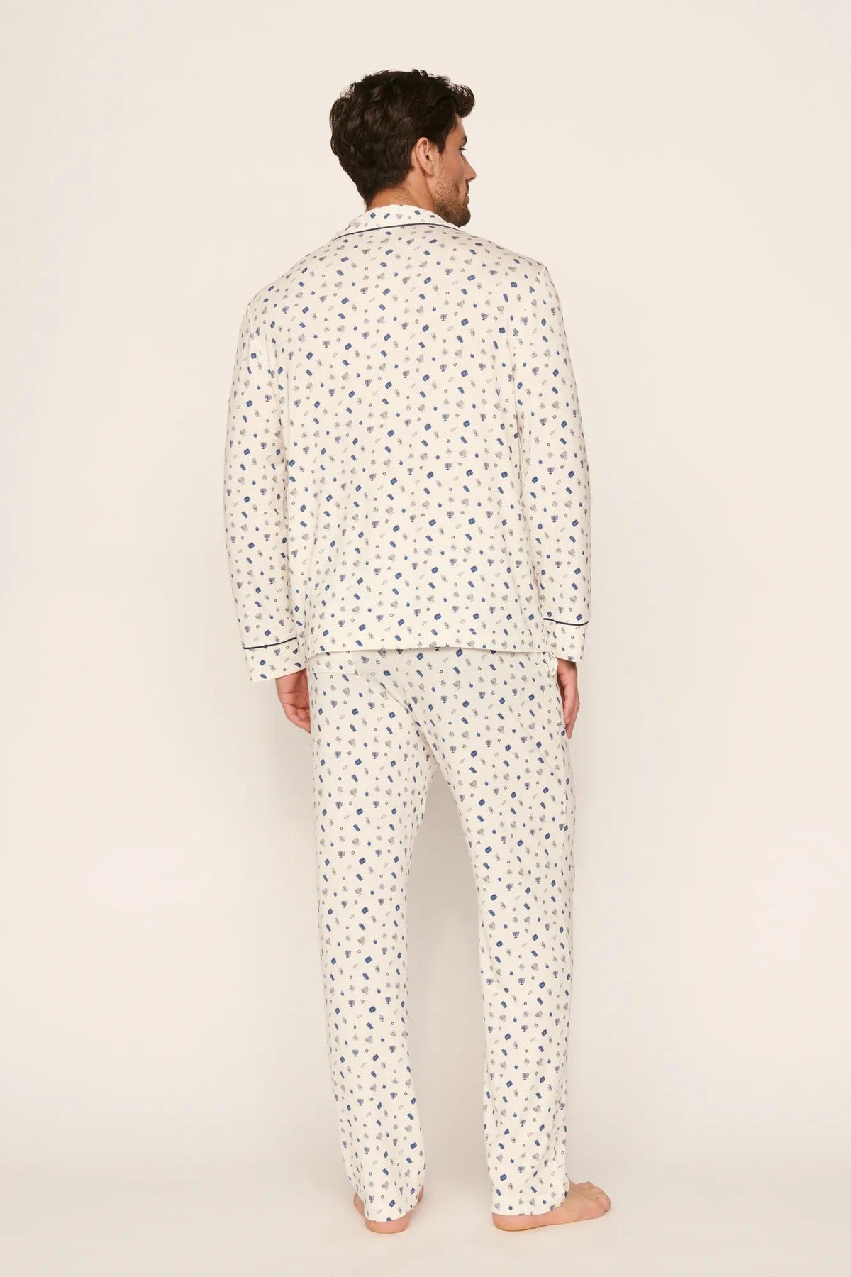 Model is wearing William Printed TENCEL™ Modal Long PJ Set in Twinkling Menorah Ivory/Navy
