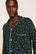 Model is wearing William Printed TENCEL™ Modal Long PJ Set in Winter Pine/Ivory