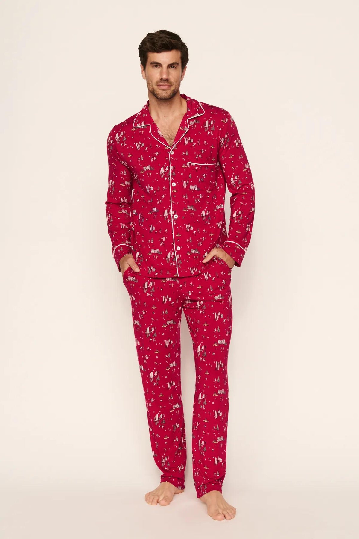 Model is wearing William Printed TENCEL™ Modal Long PJ Set in Winter Skating Holly Red/Ivory